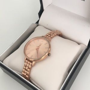 Rose Gold with Diamond Details in the Clock